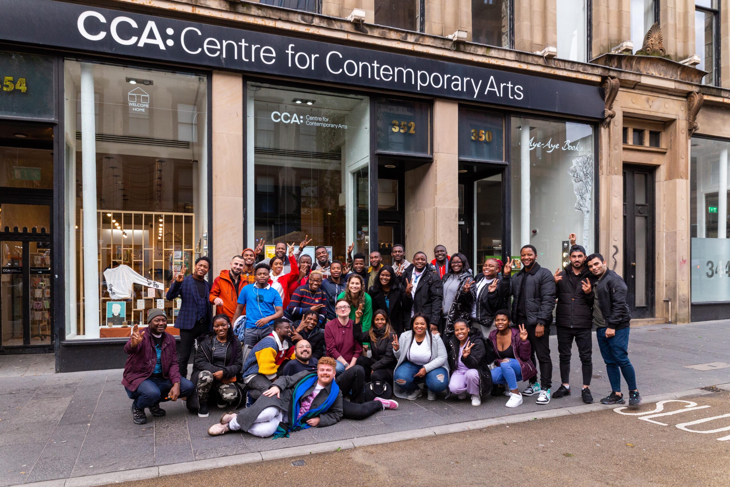Group photo of SQIFF Team and LGBT Unity Members outside the Centre for Contemporary Arts