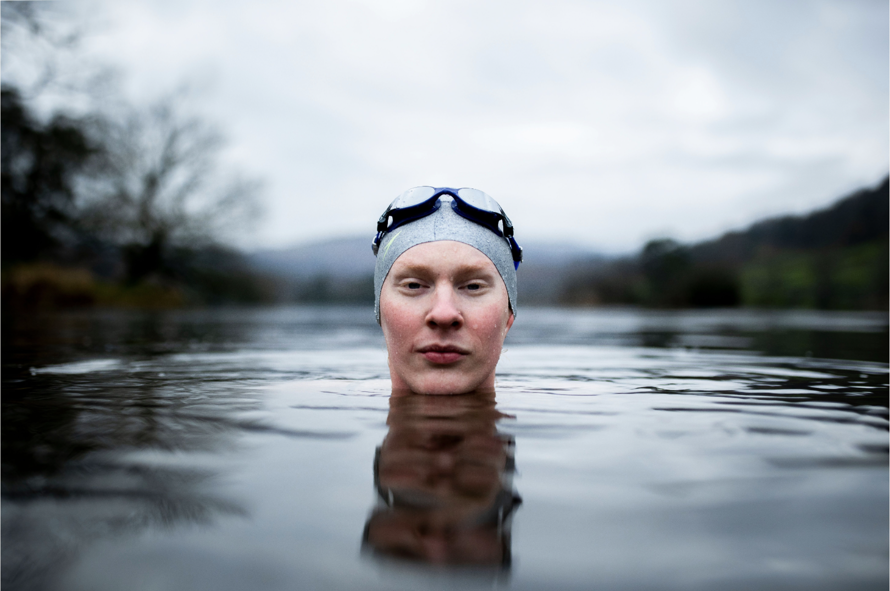 Eden Elgeti head on top of the water looking straight at the camera.