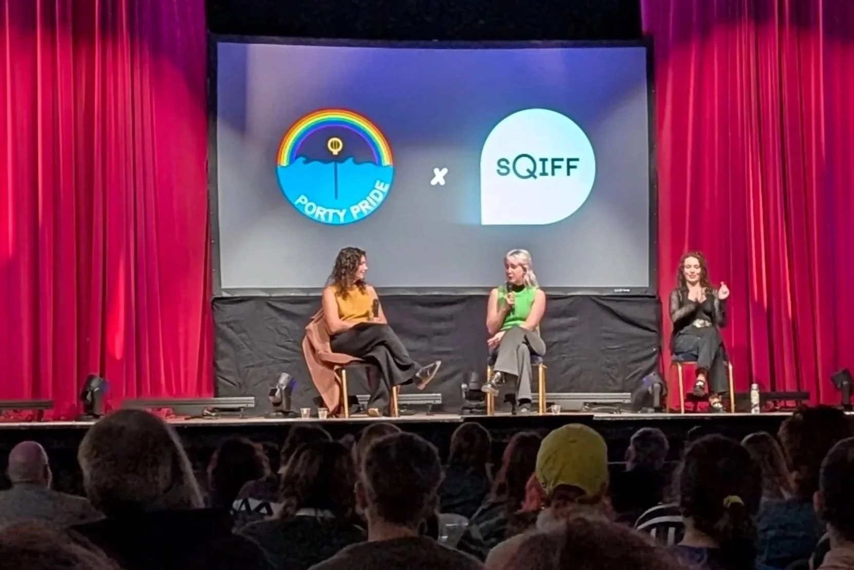 Three people in discussion on stage of the Porty Pride and SQIFF 2025 screening