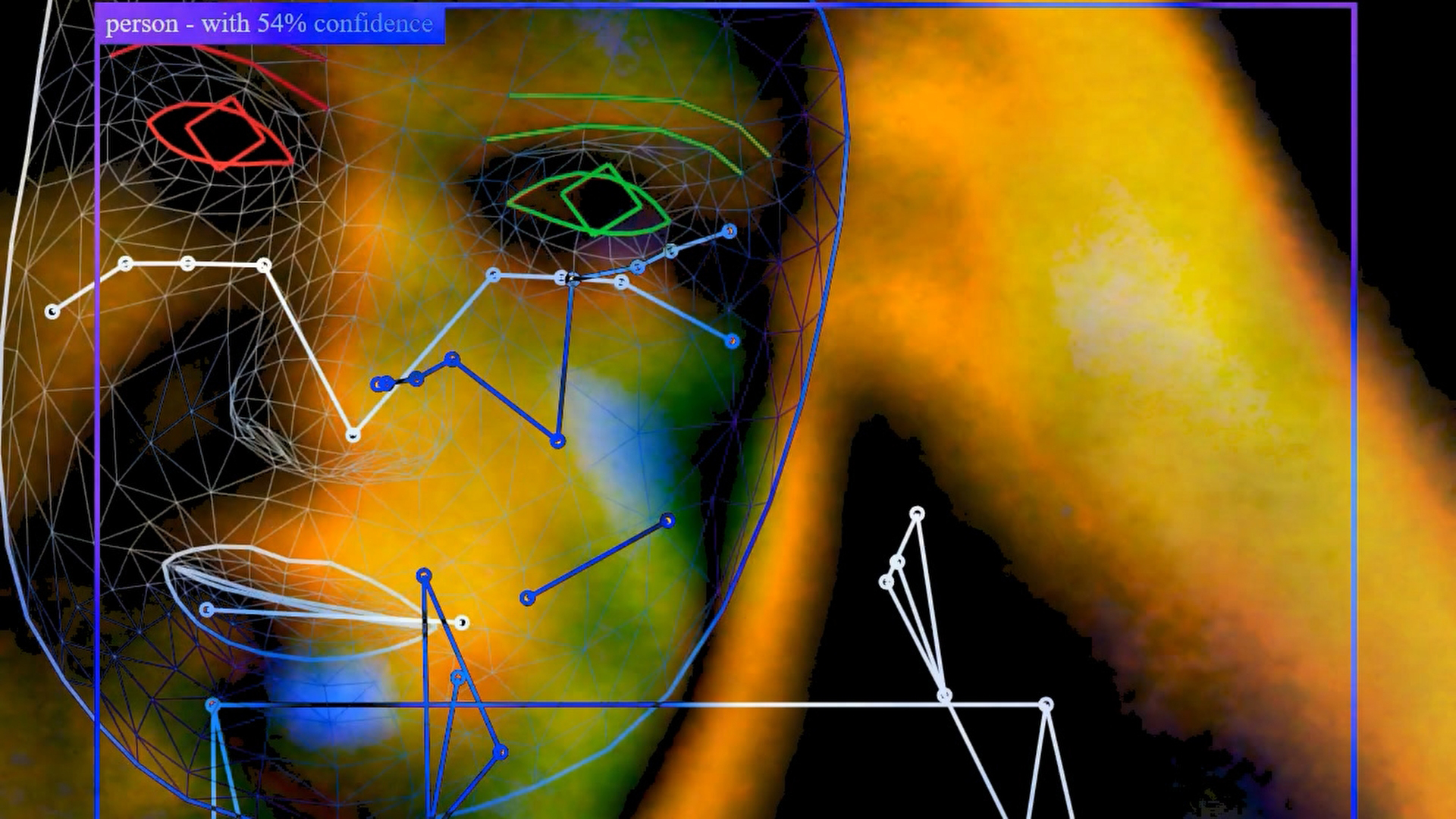 " Still from the film Trivakra featuring a close-up of a person's face staring forward with a neutral expression, heavily processed with false-color thermal tones in bright yellow and deep blue against a dark background. Overlaid across the face is a computer vision facial tracking mesh consisting of white and blue geometric wireframes and connection nodes across the nose, cheeks, and lips. "